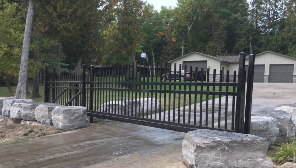 Powered residential driveway gate