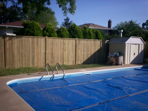 Wood pool fence