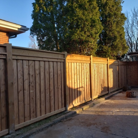 Pressure treated wood privacy acoustic fence